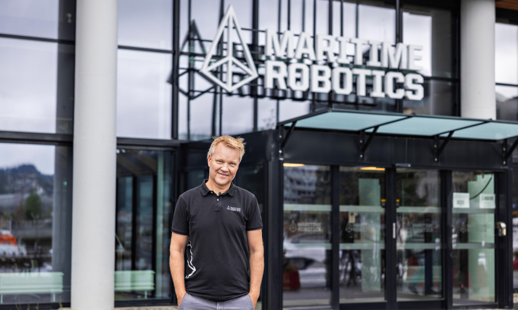 The CEO of Maritime Robotics positioned in front of the Trondheim offices.