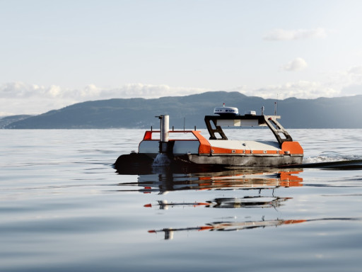 A photo of the Otter X USV surveying the fjord.